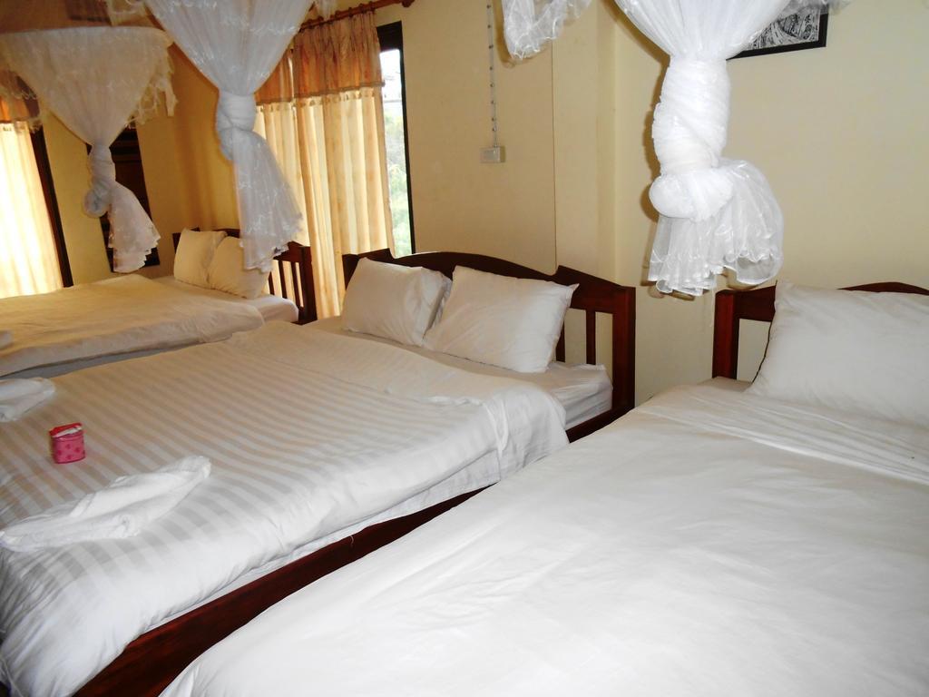 Jammee Guesthouse Vang Vieng Quarto foto