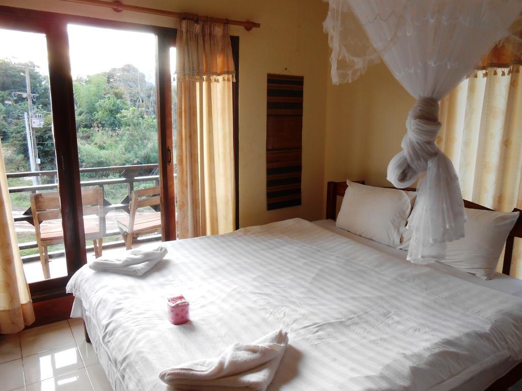 Jammee Guesthouse Vang Vieng Quarto foto