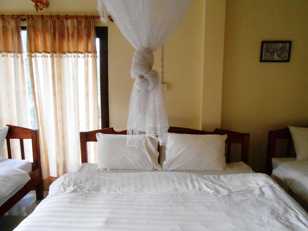 Jammee Guesthouse Vang Vieng Quarto foto