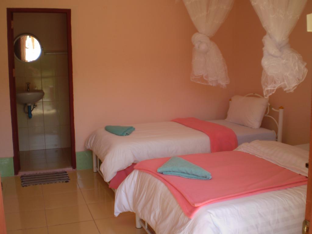 Jammee Guesthouse Vang Vieng Quarto foto