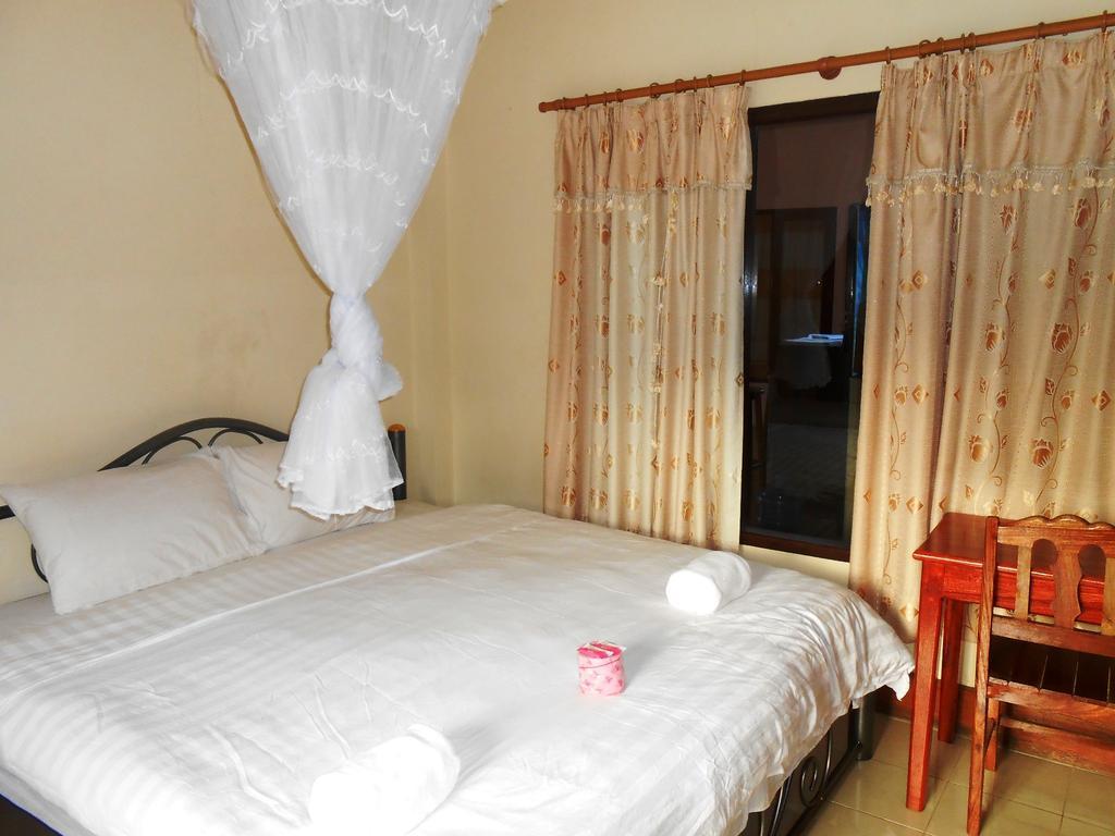 Jammee Guesthouse Vang Vieng Quarto foto
