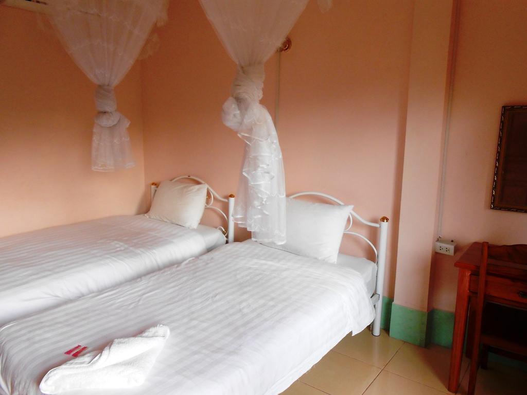 Jammee Guesthouse Vang Vieng Quarto foto
