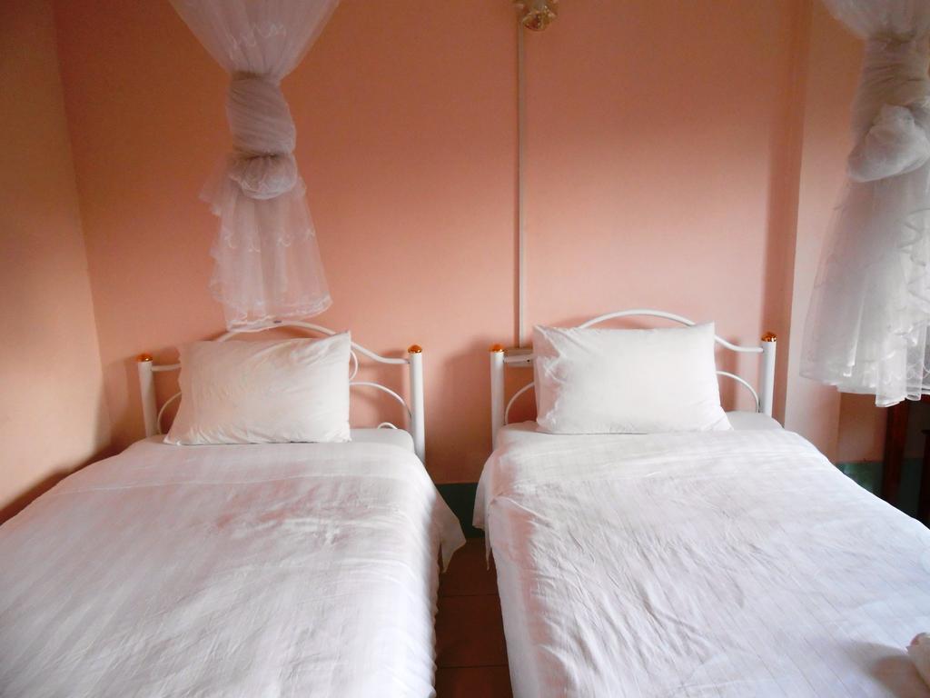 Jammee Guesthouse Vang Vieng Quarto foto