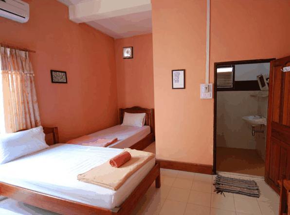 Jammee Guesthouse Vang Vieng Quarto foto