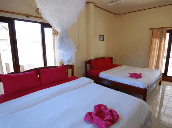 Jammee Guesthouse Vang Vieng Quarto foto